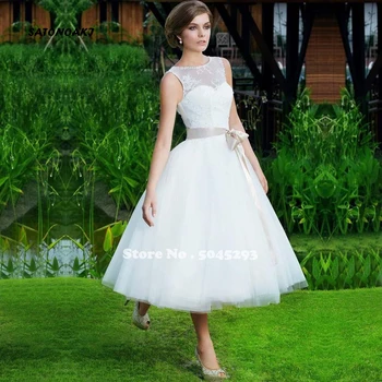 2020 biała koronkowa suknia ślubna z okrągłym dekoltem, bez rękawów, długość do połowy łydki A-Line suknia ślubna Robe mariage Vestido De Novia online